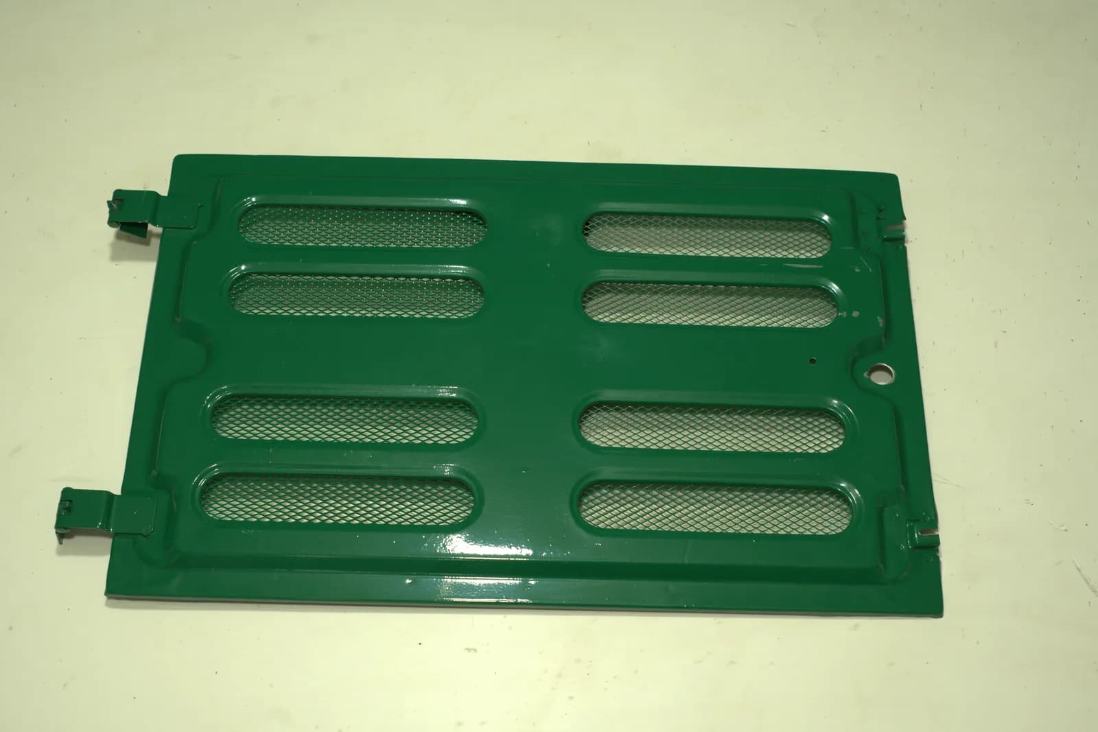 MAE engine cover on the factory workbench