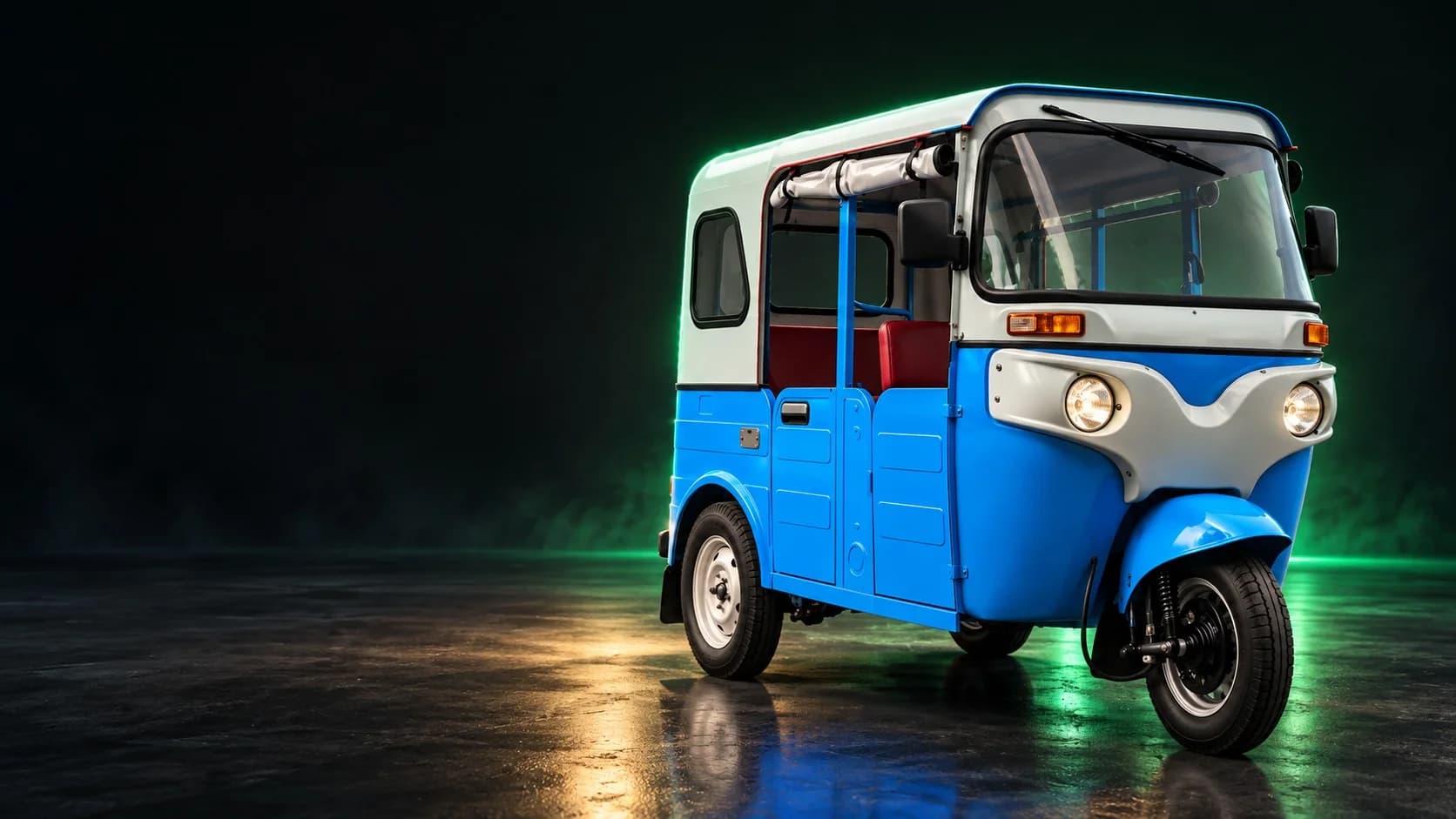 Torrit EV electric three-wheeler in a dark studio