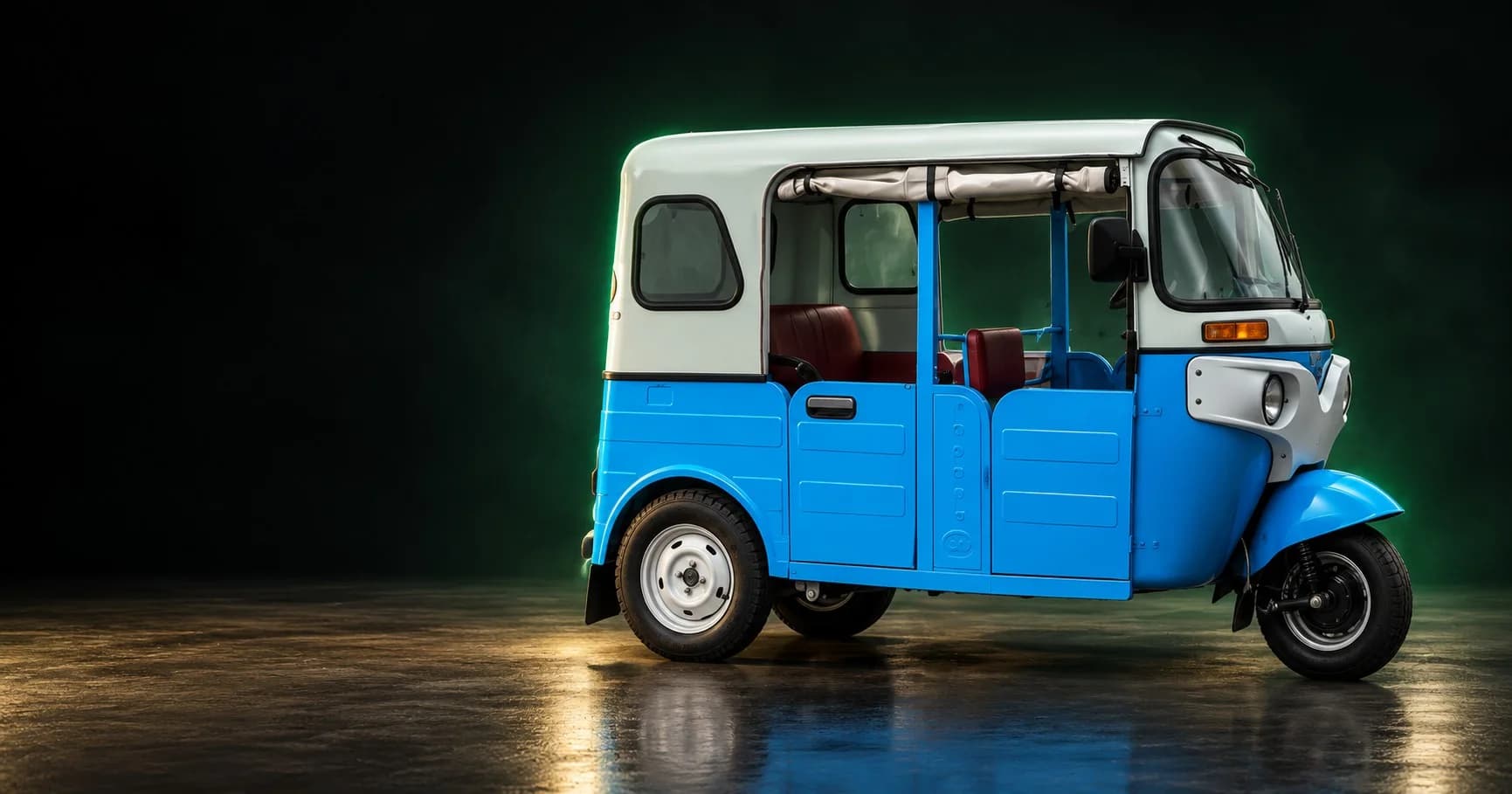 Torrit EV in a dark studio, side view